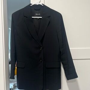 Relaxed Black Blazer in soft drape.